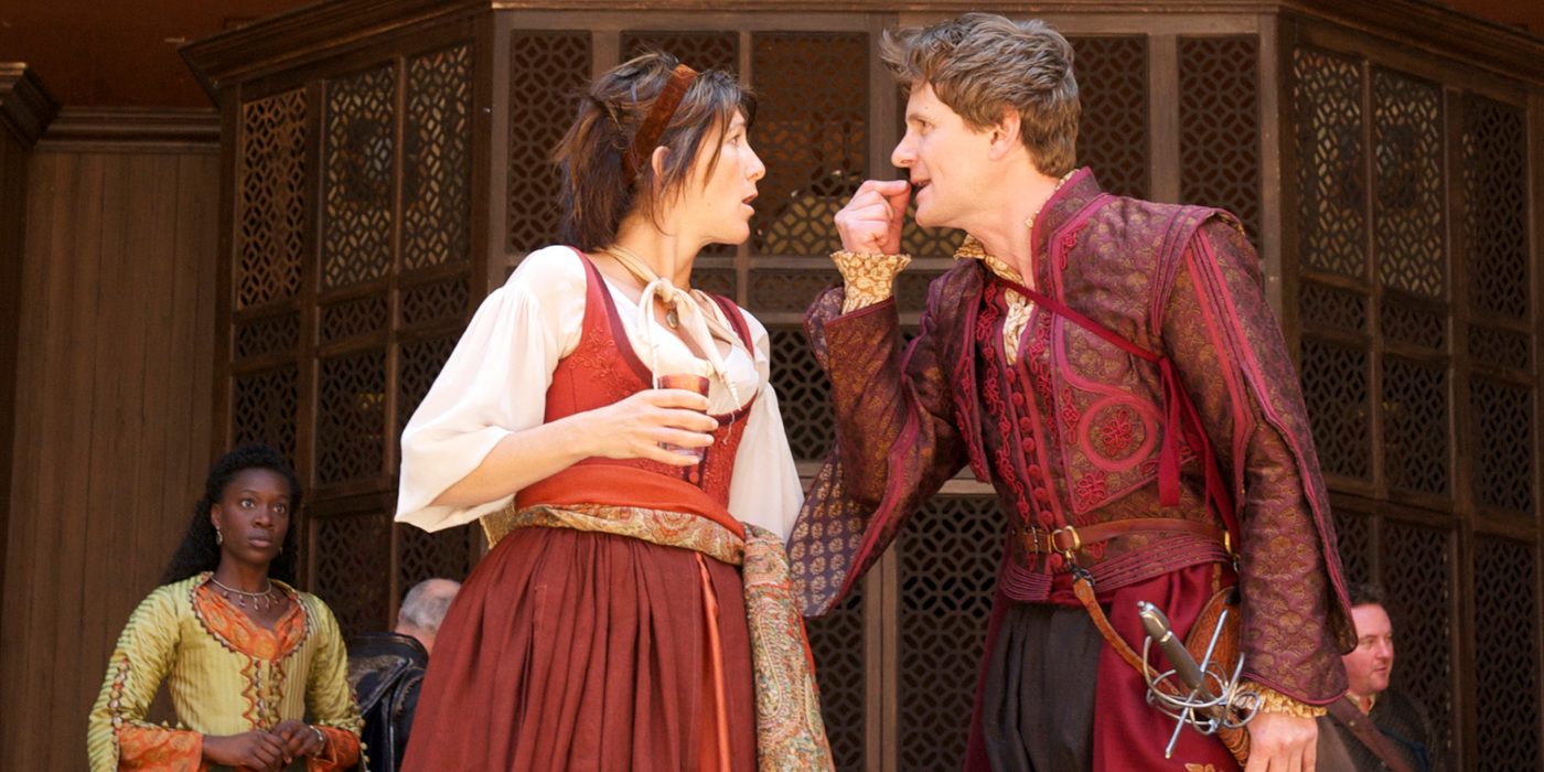 A woman and a man face each other, arguing.