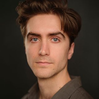 Finn O'Riordain looking directly at the camera.