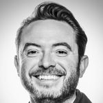 This is a headshot of Paul Wills looking directly into the camera.
