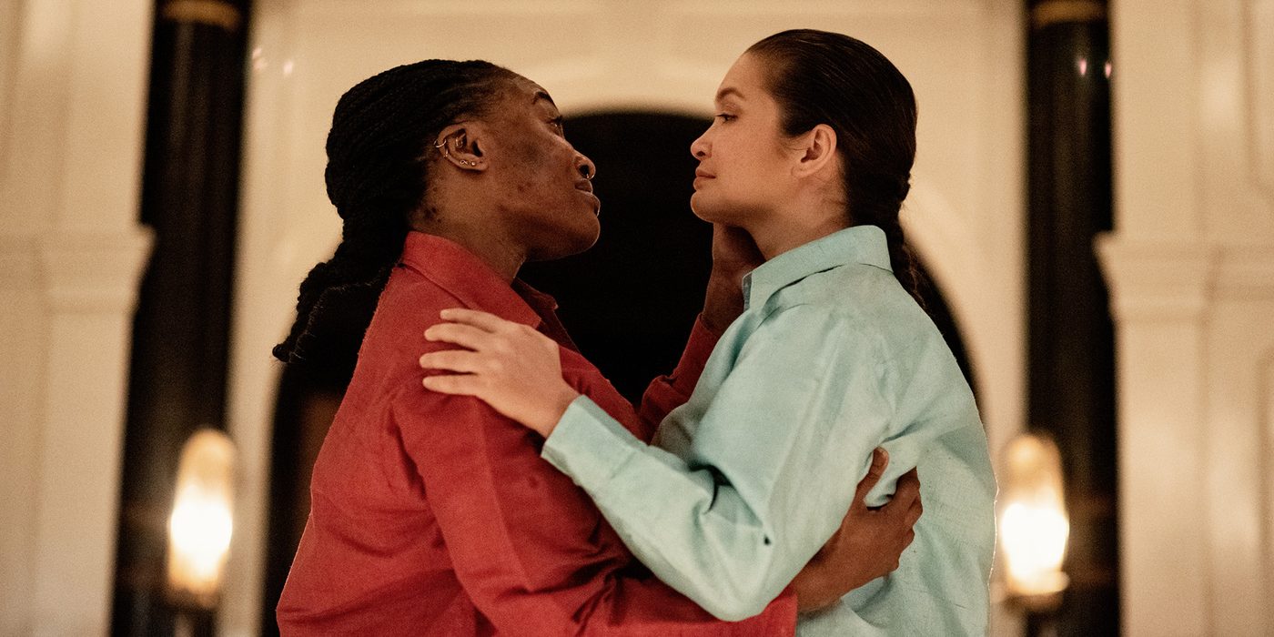 Two actors hold each other