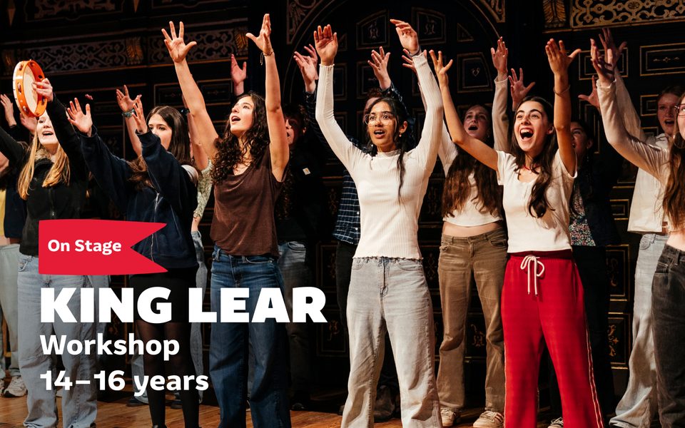 On stage King Lear Workshop 14-16 years. Group of cheering young people on stage with their hands raised.